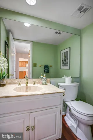 a view of a room with clothes shoes and a large window