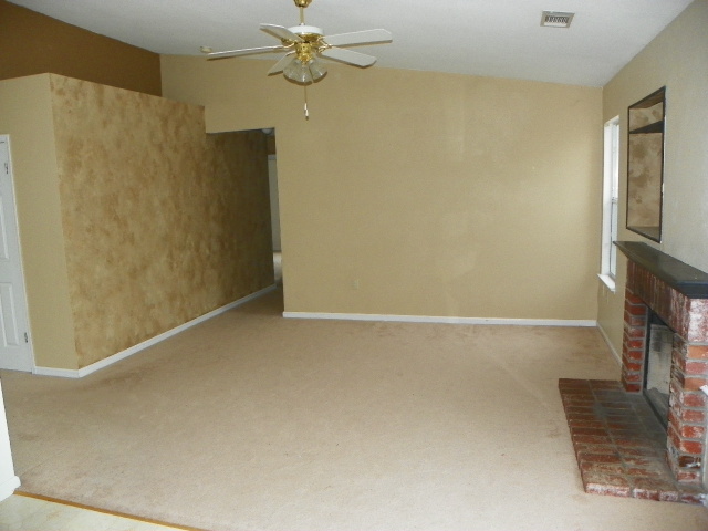 710 Mallard Street Redding, CA 96003 - Photo 5 of 19 a view of an empty room with a window