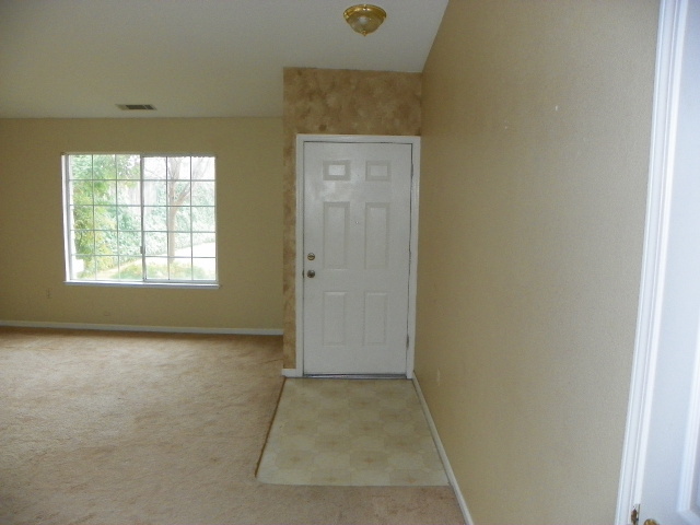 710 Mallard Street Redding, CA 96003 - Photo 8 of 19 an empty room with windows