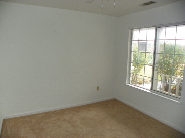 710 Mallard Street Redding, CA 96003 - Photo 10 of 19 an empty room with a window