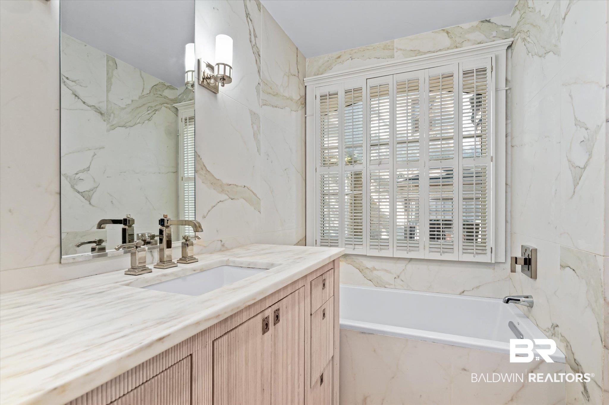 3921 McGregor Court Mobile, AL 36608 - Photo 20 of 41 Bathroom featuring a garden tub, tile walls, and vanity