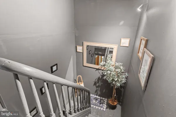 a view of entryway with wooden floor