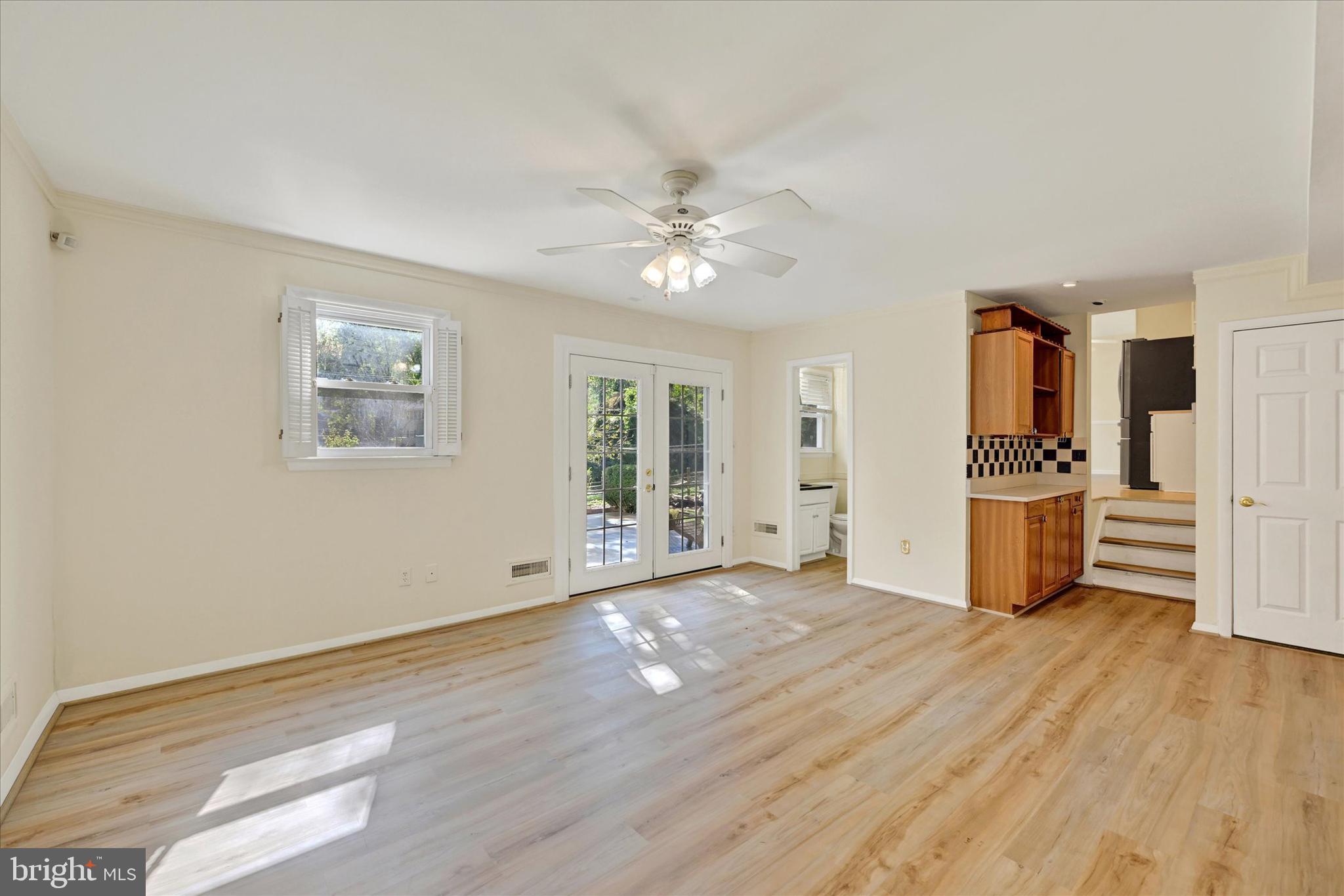 809 Providence Road Towson, MD 21286 - Photo 13 of 26 a view of a kitchen with wooden floor and a kitchen