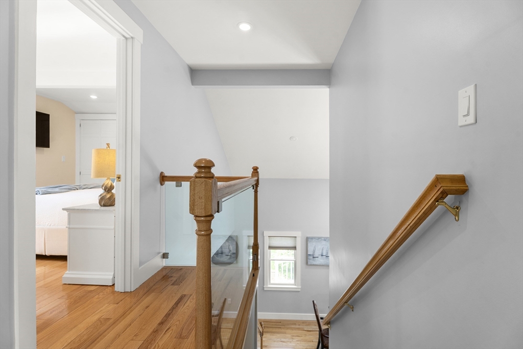 4 Hye Lane Edgartown, MA 02539 - Photo 10 of 41 a view of a hallway with wooden floor and staircase
