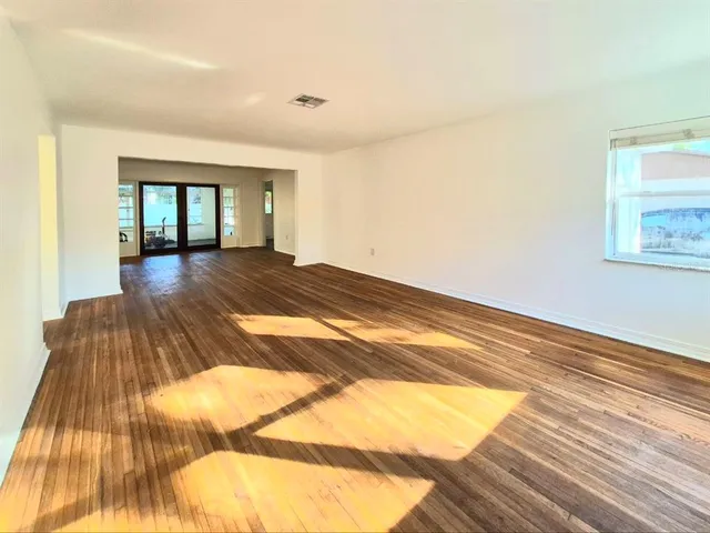 a view of an empty room and window