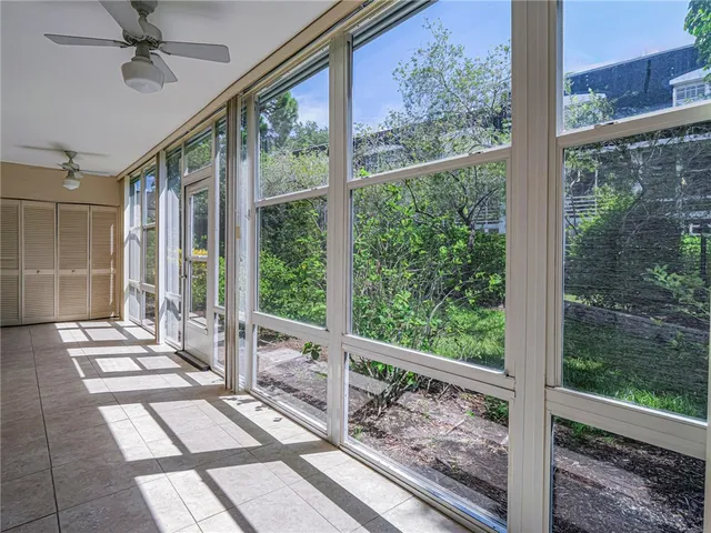 a view of a patio with wooden floor