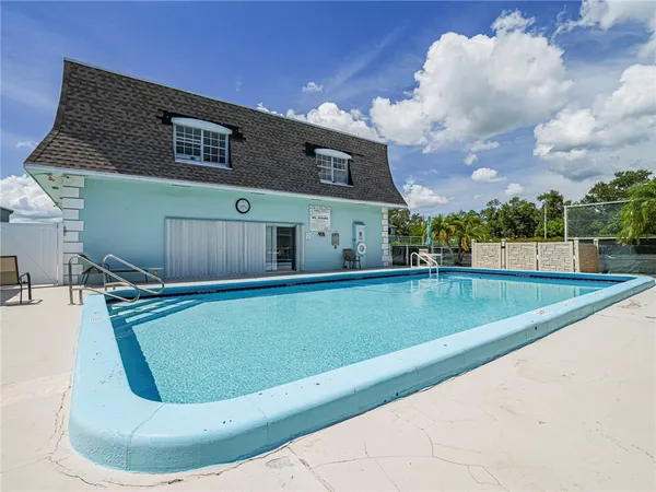 a view of a house with a swimming pool