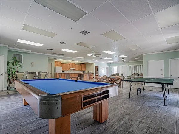 a room with furniture and wooden floor