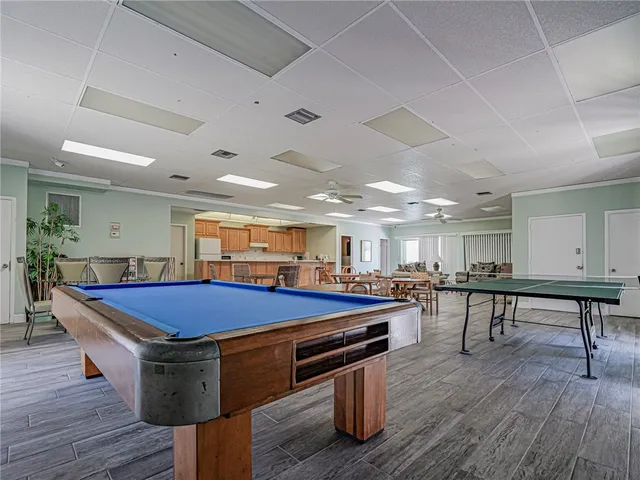 a room with furniture and wooden floor