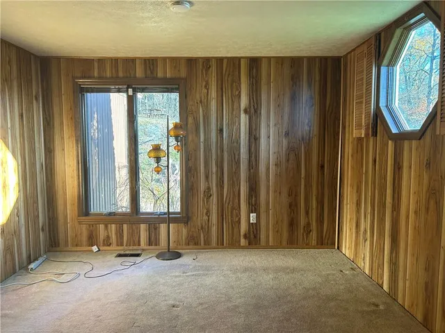 an empty room with windows