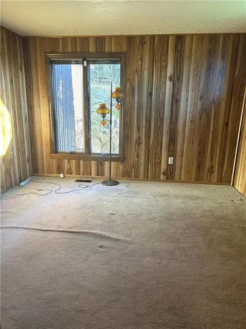 a view of an entryway with a window