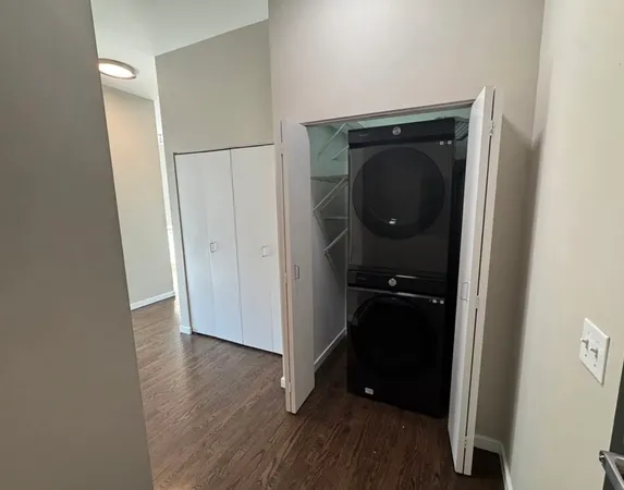 a close view of a utility room with a washer and dryer