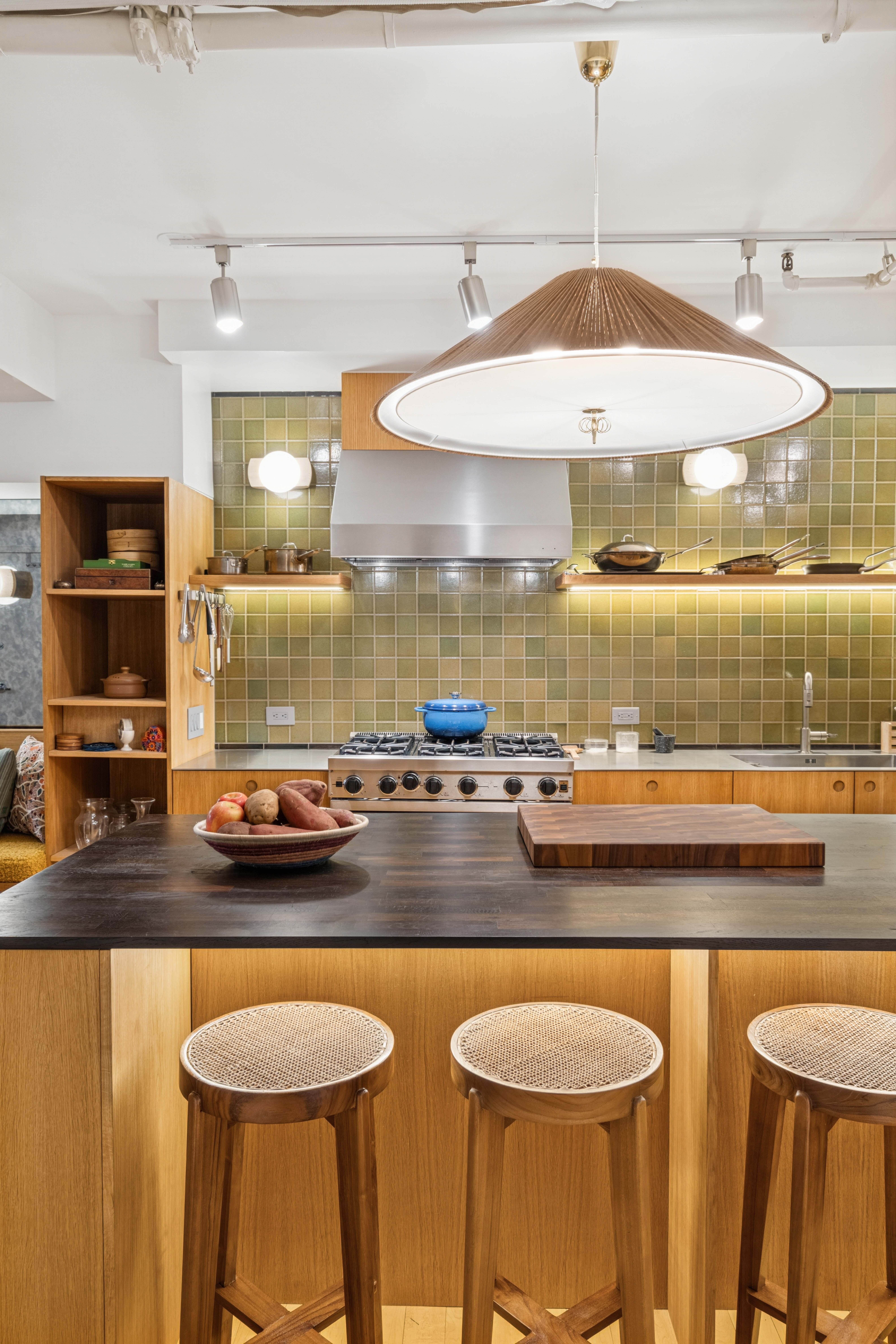 195 Bowery, Unit 4 Manhattan, NY 10002 - Photo 3 of 13 a kitchen with a table and chairs in it