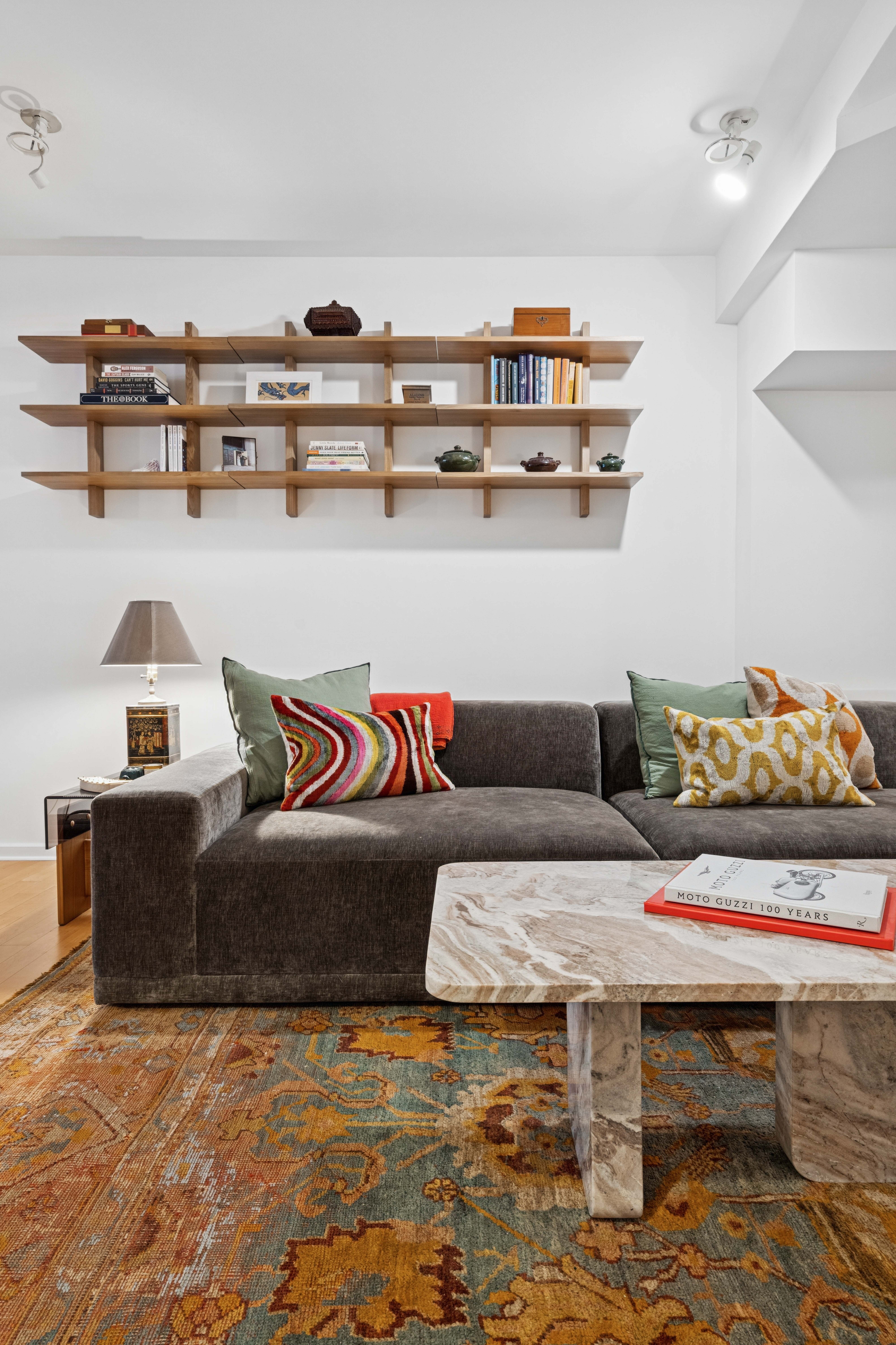 195 Bowery, Unit 4 Manhattan, NY 10002 - Photo 6 of 13 a living room with furniture and a table