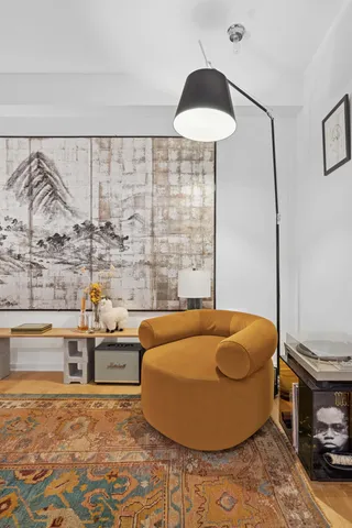 a room with furniture and a rug