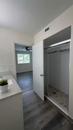 a view of an empty room and window