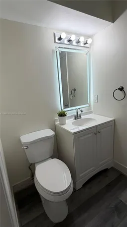 a view of a hallway with staircase