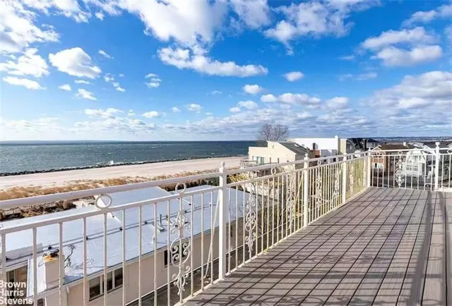 a view of a balcony with city view