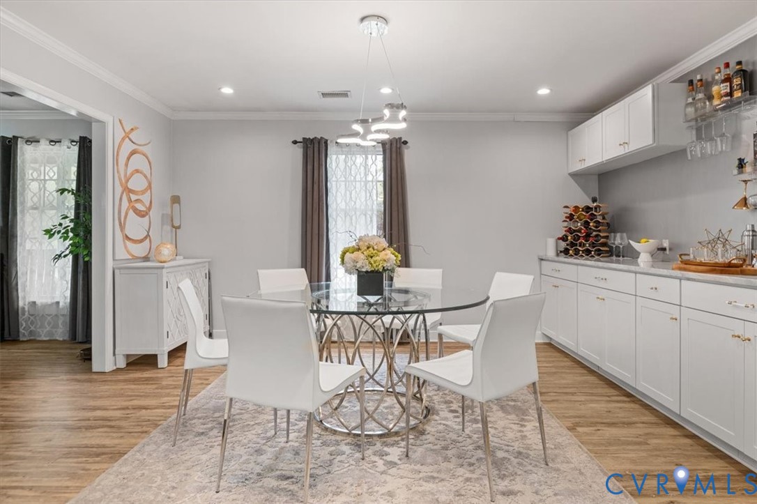 9820 Beaver Bridge Road Chesterfield, VA 23838 - Photo 12 of 54 Open-concept dining area, contemporary chandelier,