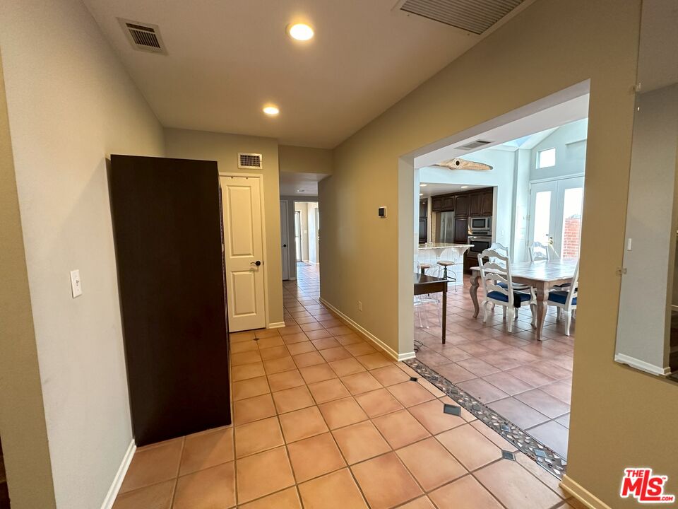 135 Napoleon Street Playa del Rey, CA 90293 - Photo 20 of 36 a view of a hallway to dining room with furniture