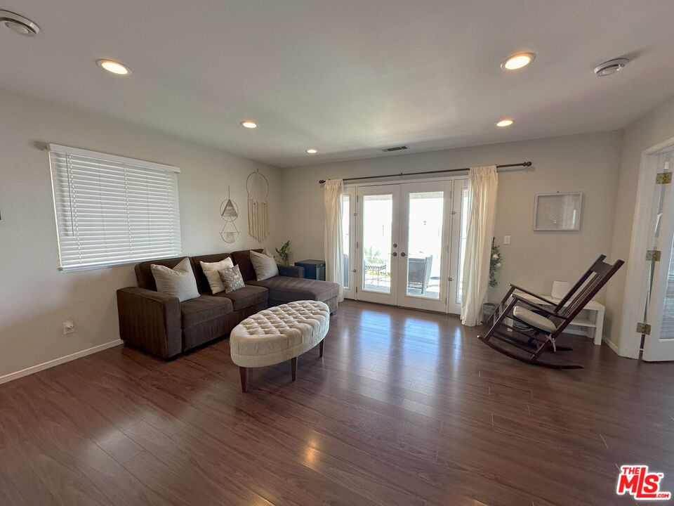 135 Napoleon Street Playa del Rey, CA 90293 - Photo 22 of 36 a living room with furniture and a wooden floor