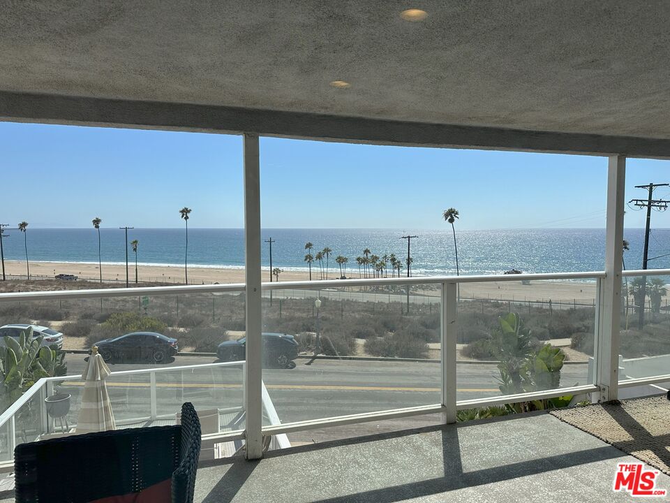 135 Napoleon Street Playa del Rey, CA 90293 - Photo 25 of 36 a glass window table and chairs in the balcony