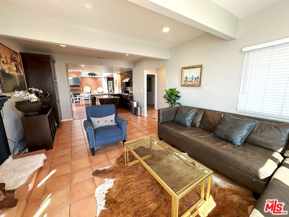 135 Napoleon Street Playa del Rey, CA 90293 - Photo 8 of 36 a living room with furniture and a wooden floor