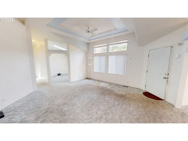 a open hall with a lot of white walls