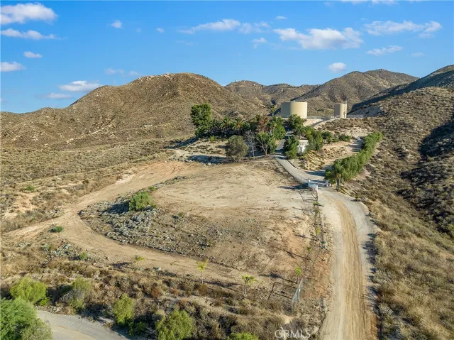 a view of water from a yard