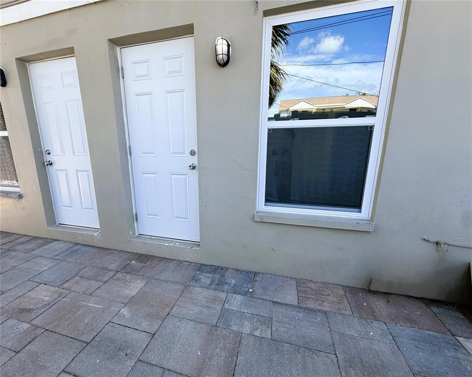 14120 Palm Street, Unit 104 Madeira Beach, FL 33708 - Photo 13 of 18 a view of an entryway