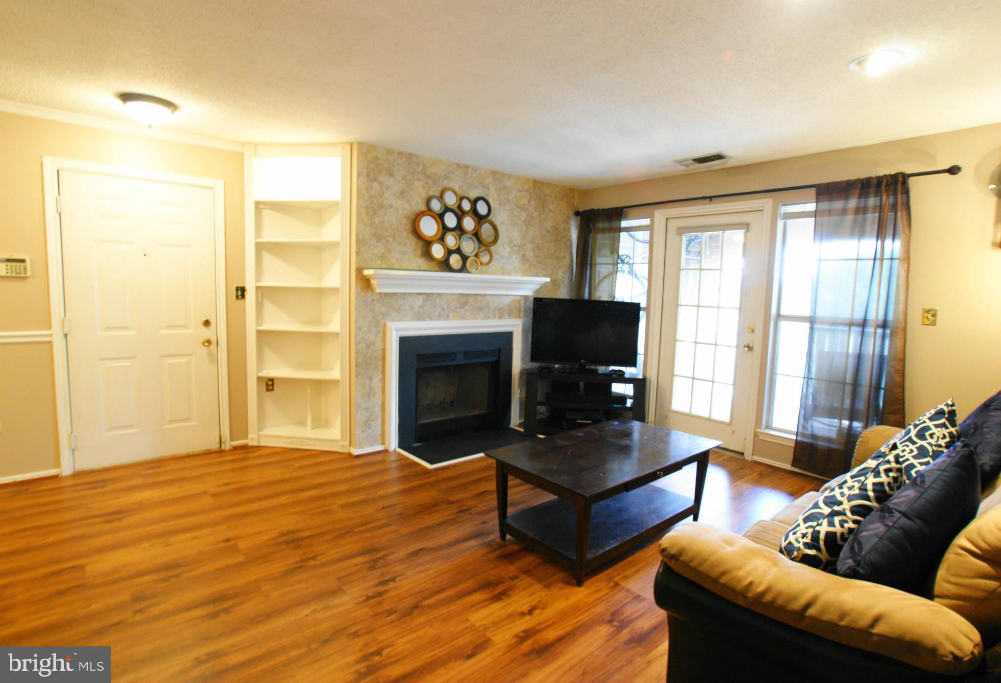 21007 Timber Ridge Terrace, Unit 201 Ashburn, VA 20147 - Photo 13 of 18 Improved Living Room