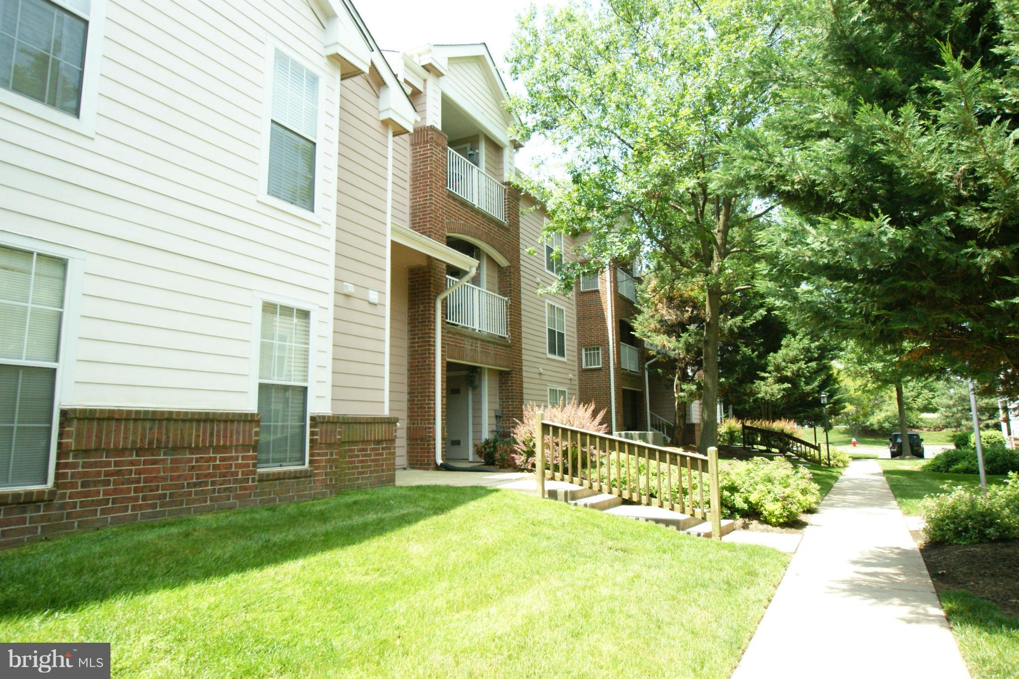 21007 Timber Ridge Terrace, Unit 201 Ashburn, VA 20147 - Photo 16 of 18 Exterior Rear