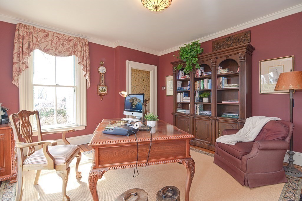202 Paine Street Bellingham, MA 02019 - Photo 12 of 42 a living room with furniture and window