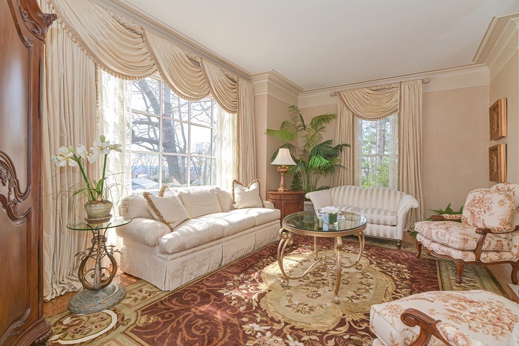 202 Paine Street Bellingham, MA 02019 - Photo 15 of 42 a living room with furniture and a large window