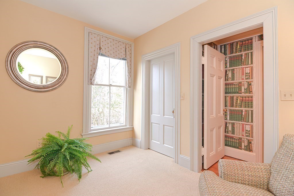202 Paine Street Bellingham, MA 02019 - Photo 17 of 42 an empty room with windows and closet