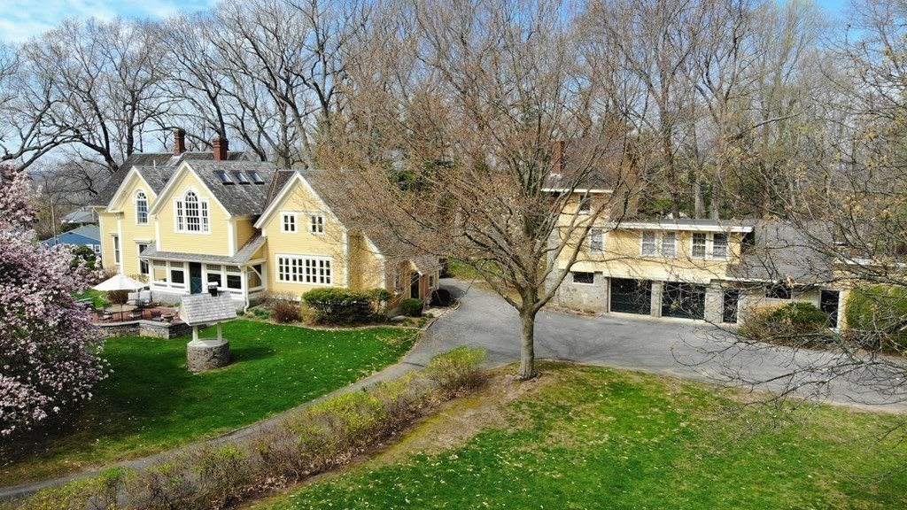 202 Paine Street Bellingham, MA 02019 - Photo 39 of 42 a front view of a house with a yard