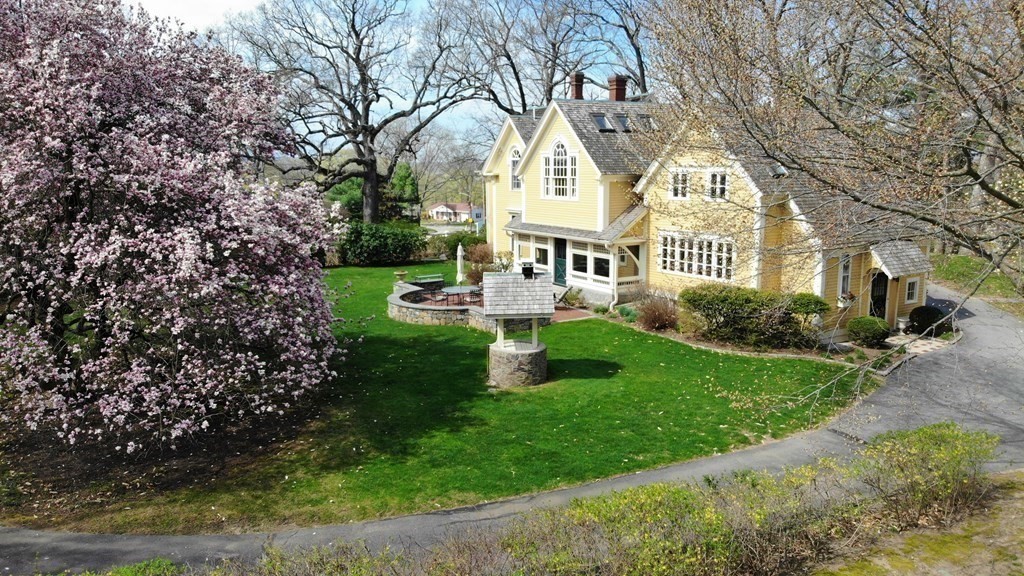 202 Paine Street Bellingham, MA 02019 - Photo 40 of 42 a front view of a house with a yard