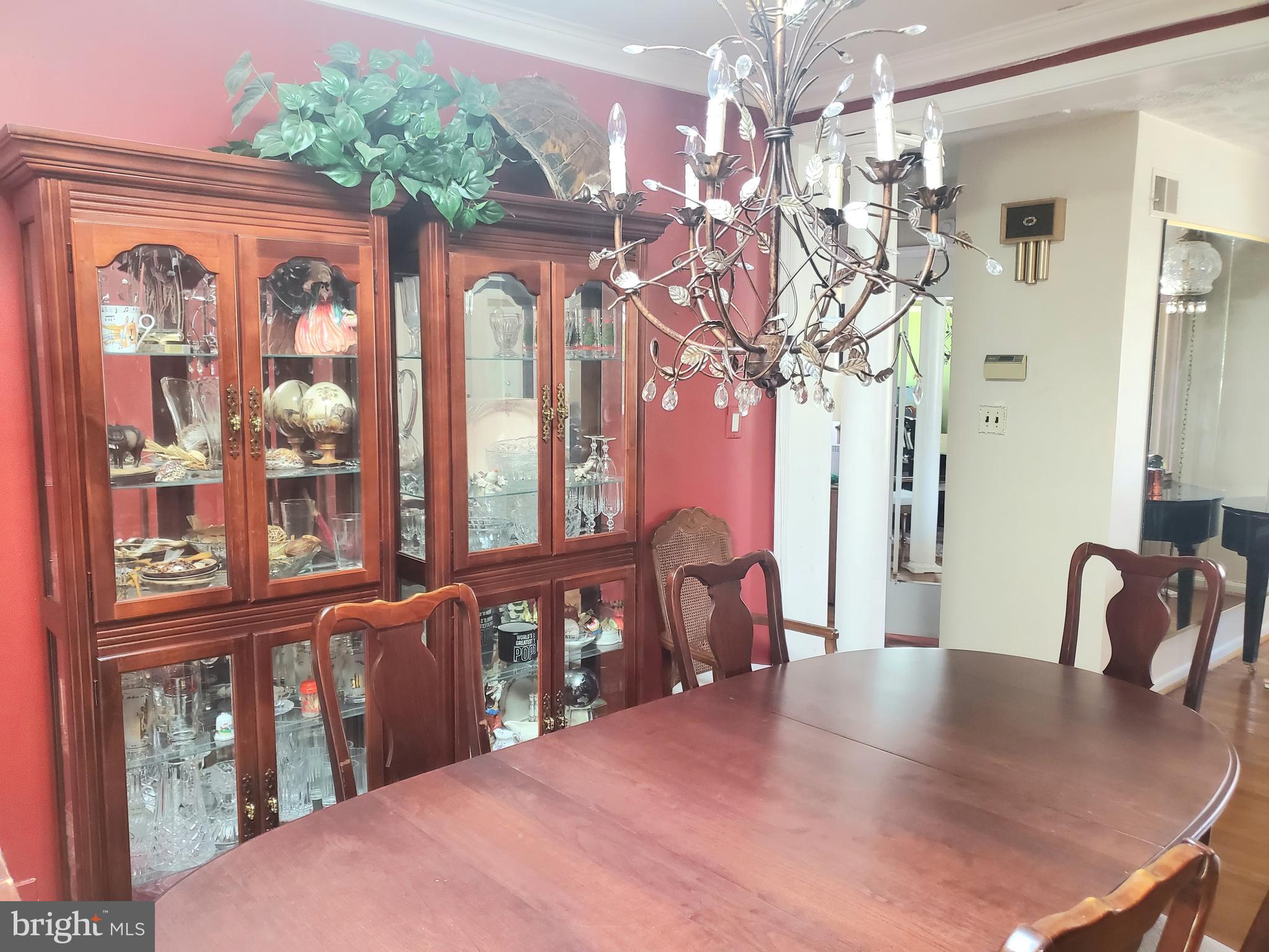 1514 Oakview Drive Silver Spring, MD 20903 - Photo 4 of 9 a view of a porch with furniture and chandelier