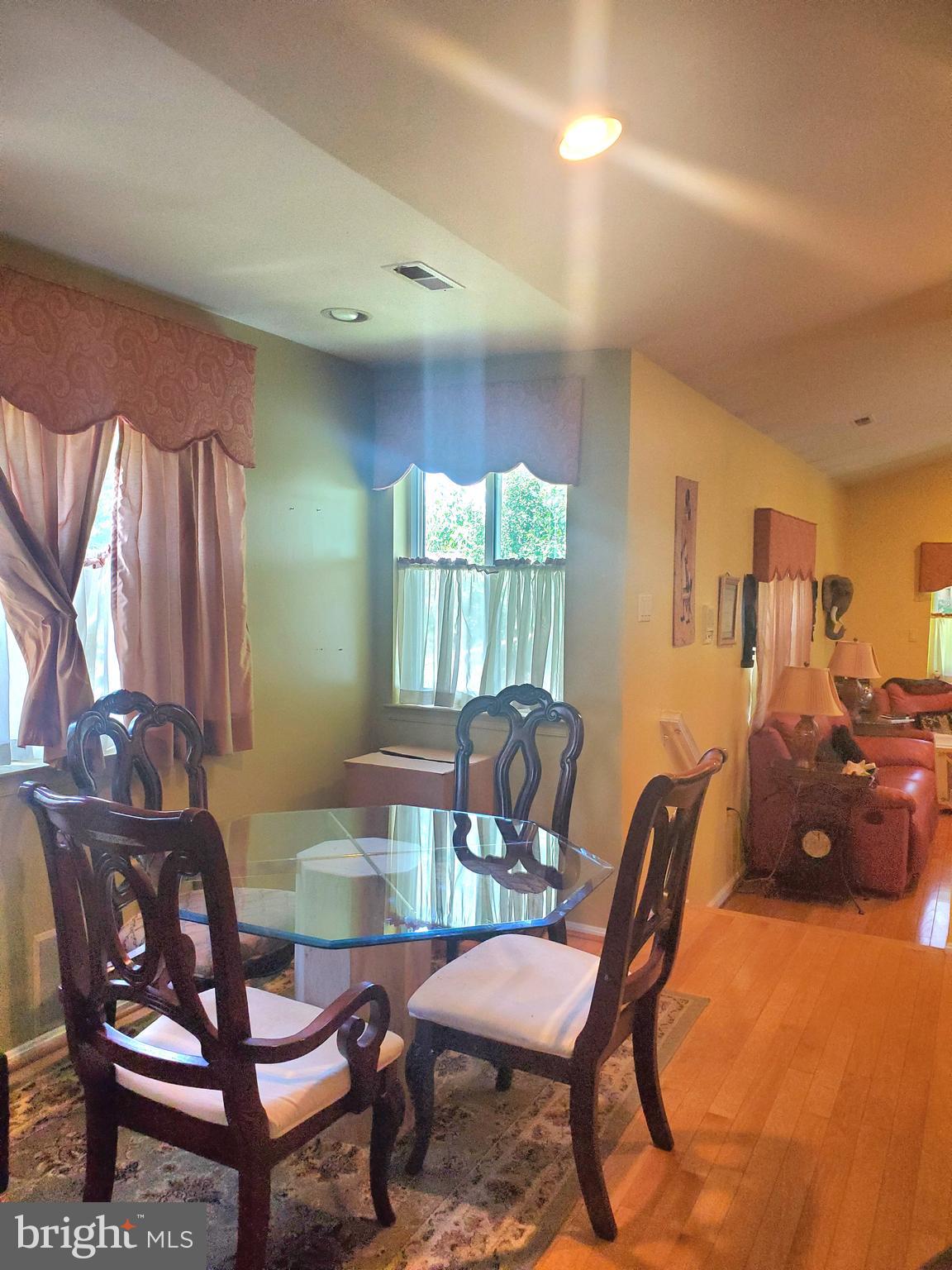 1514 Oakview Drive Silver Spring, MD 20903 - Photo 6 of 9 a dining room with furniture and window