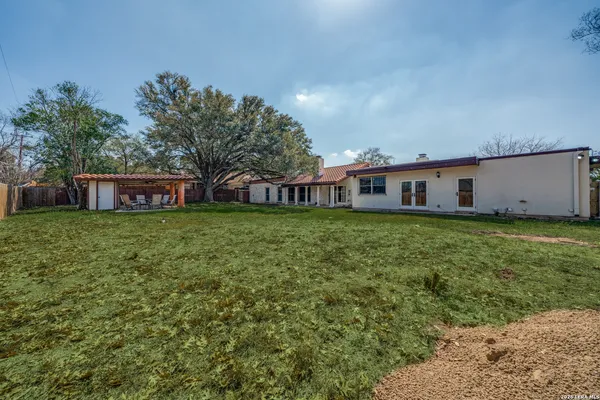 a view of a house with a big yard