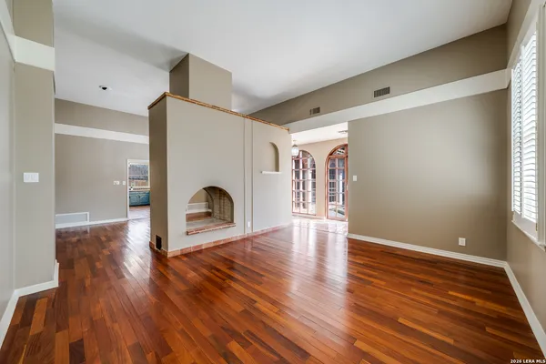 a view of livingroom with hardwood floor and a ceiling fan