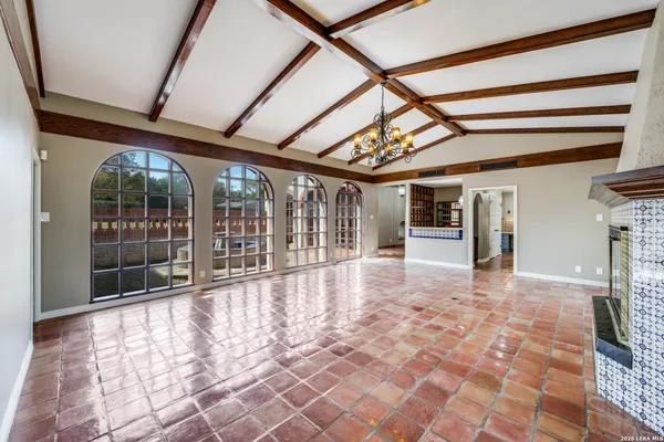 a view of an entryway with a floor to ceiling window