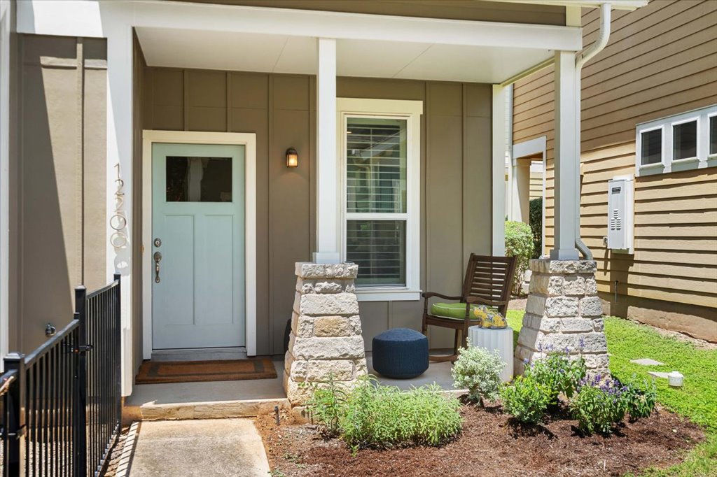 12200 Tawny Farms Road, Unit 139 Austin, TX 78748 - Photo 3 of 30 Imagine sitting out here with your morning coffee! The front porch is incredibly inviting, with plenty of room for a cozy rocking chair and accent pieces.