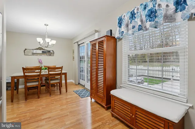 a kitchen with a stove a sink and a refrigerator