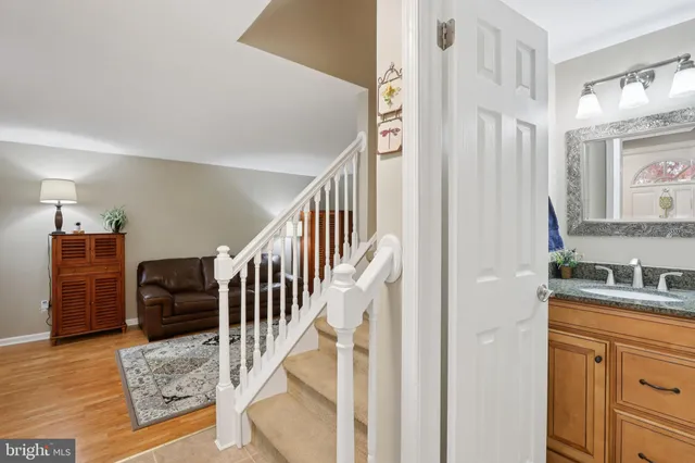 a spacious bedroom with a bed and a dresser