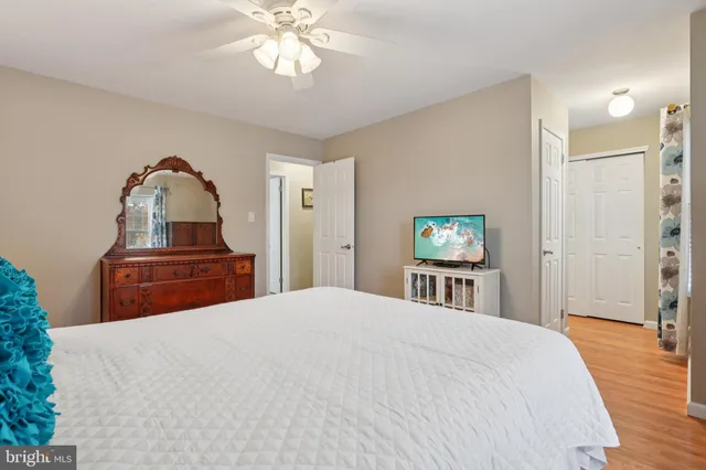 a view of a bedroom from a hallway