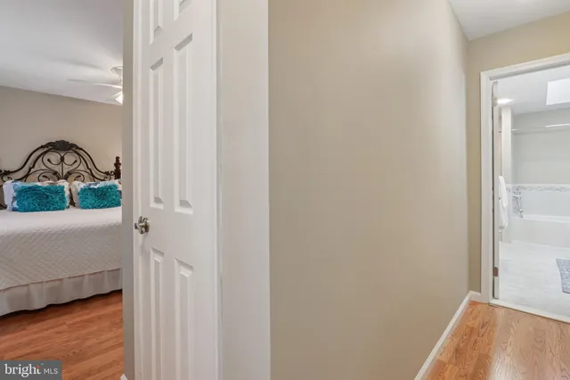 a bathroom with a sink a mirror and a bathtub