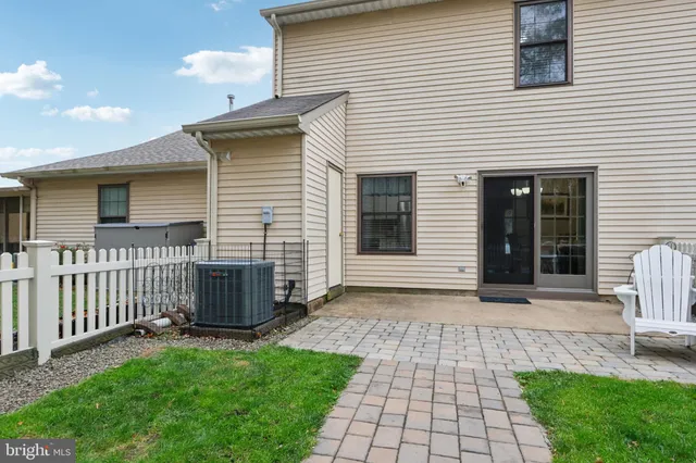a picture of a bench in a white building