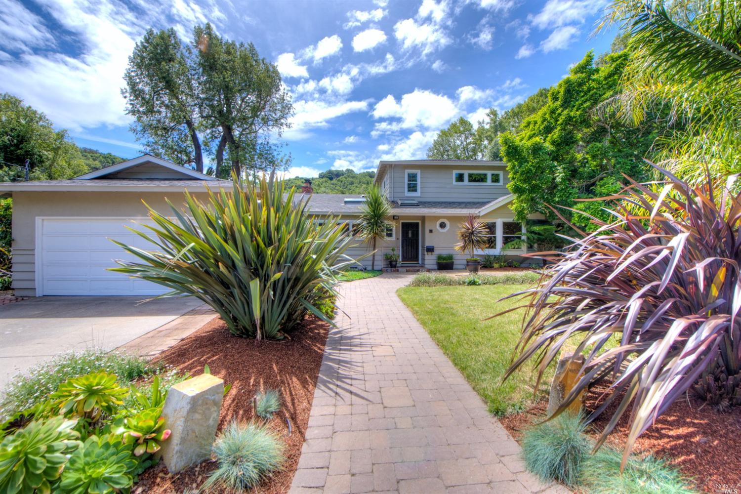 71 Robinhood Drive San Rafael, CA 94901 - Photo 1 of 1 a view of a palm trees in front of a building