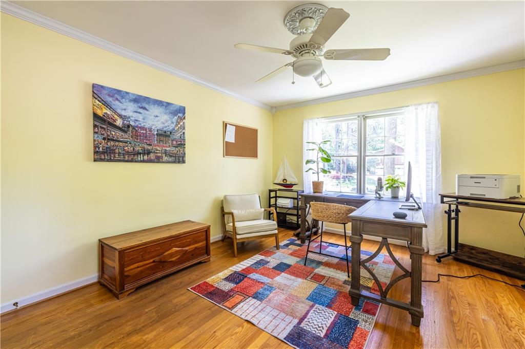 3598 Hidden Acres Drive Atlanta, GA 30340 - Photo 12 of 23 a bedroom with a bed and wooden floor